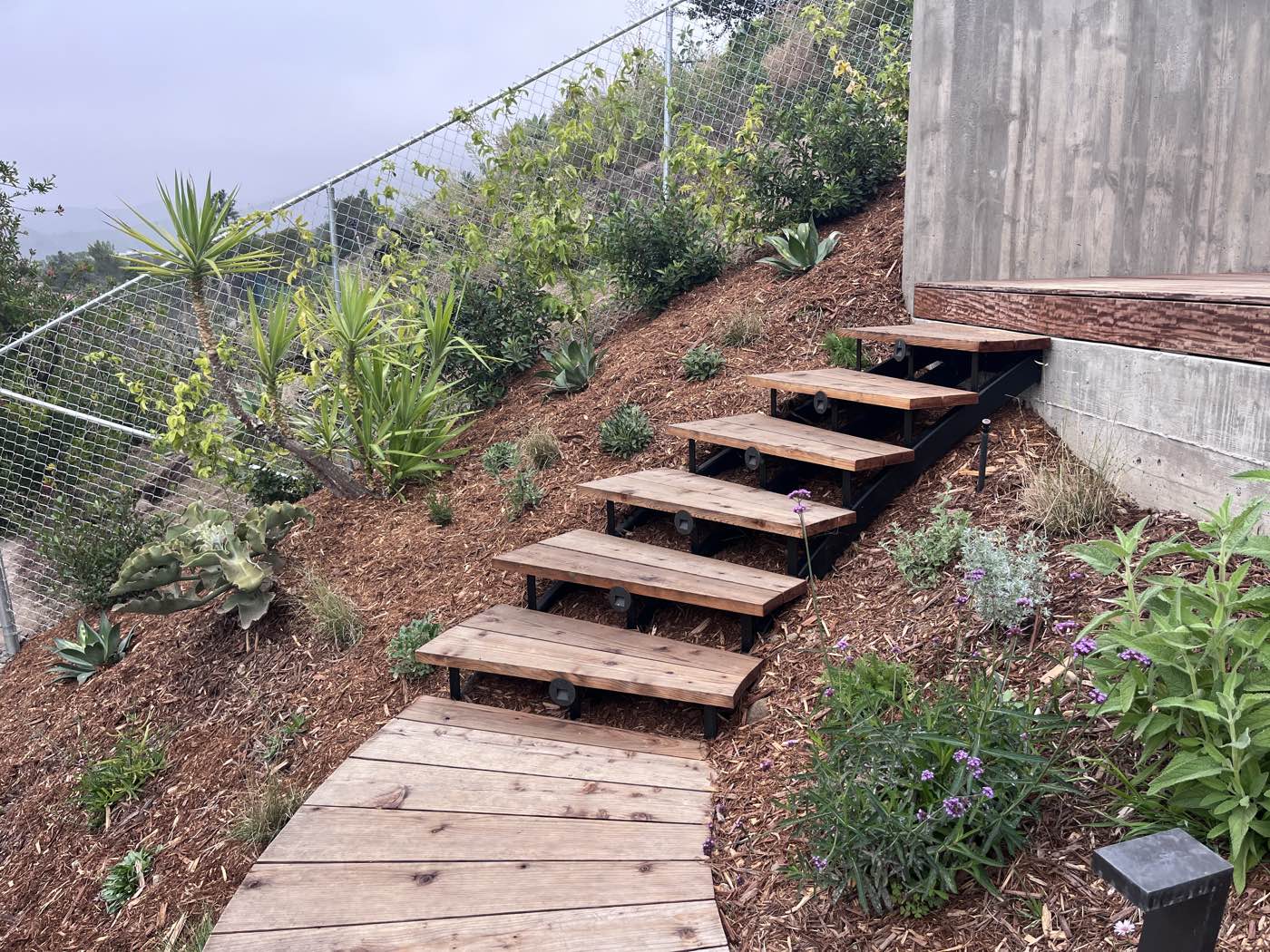Custom deck stairs with handrails in Mar Vista